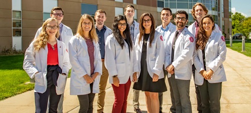 Group of Med Students in White Lab Coats.