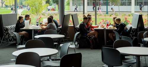 Students in Booths Inside the Muenster University Center