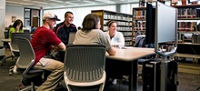 Students Sitting at Table.