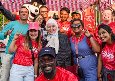 Group of International Students Attending GatheRED Event