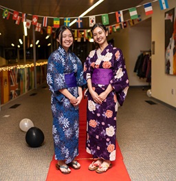 Two Females Attending International Night Gala Event