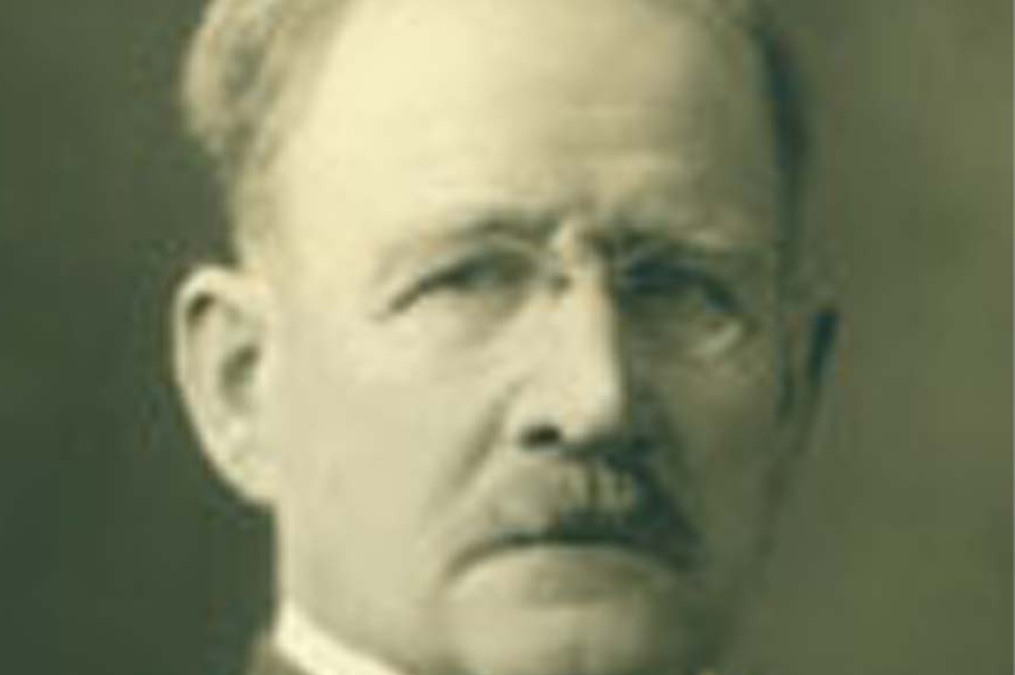 USD Former President Garret Droppers' portrait.