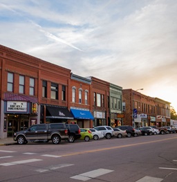 Parked cars and buildings in downtown Vermillion.
