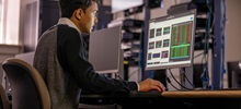 Computer Science person looking at a computer screen