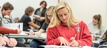 Students Working on Assignments in Classroom