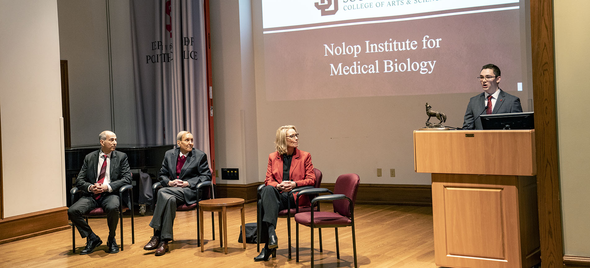 People on stage at Nolop Institute dedication