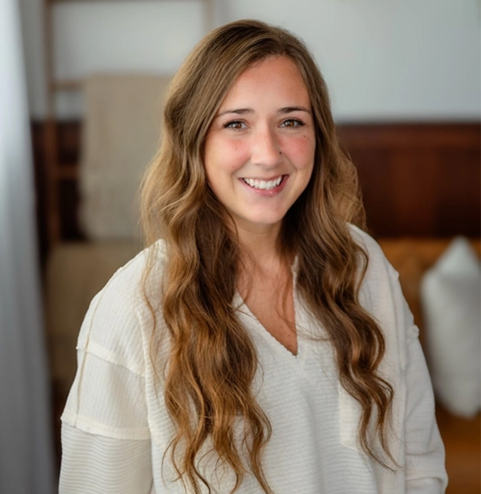 Headshot of Abbie the Keynote speaker for educators rising