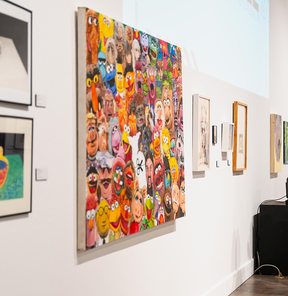 Paintings on the wall at USD's art gallery