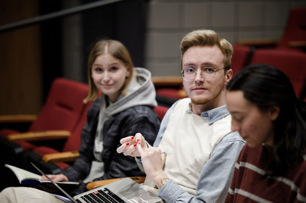 Director students sitting in theatre seating
