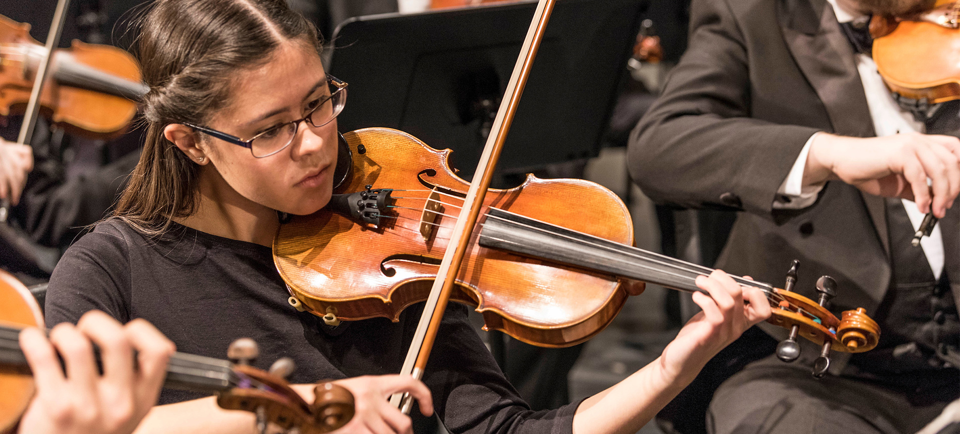 The USD Symphony Orchestra playing.