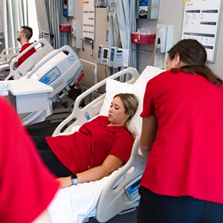 Health sciences students working in lab.