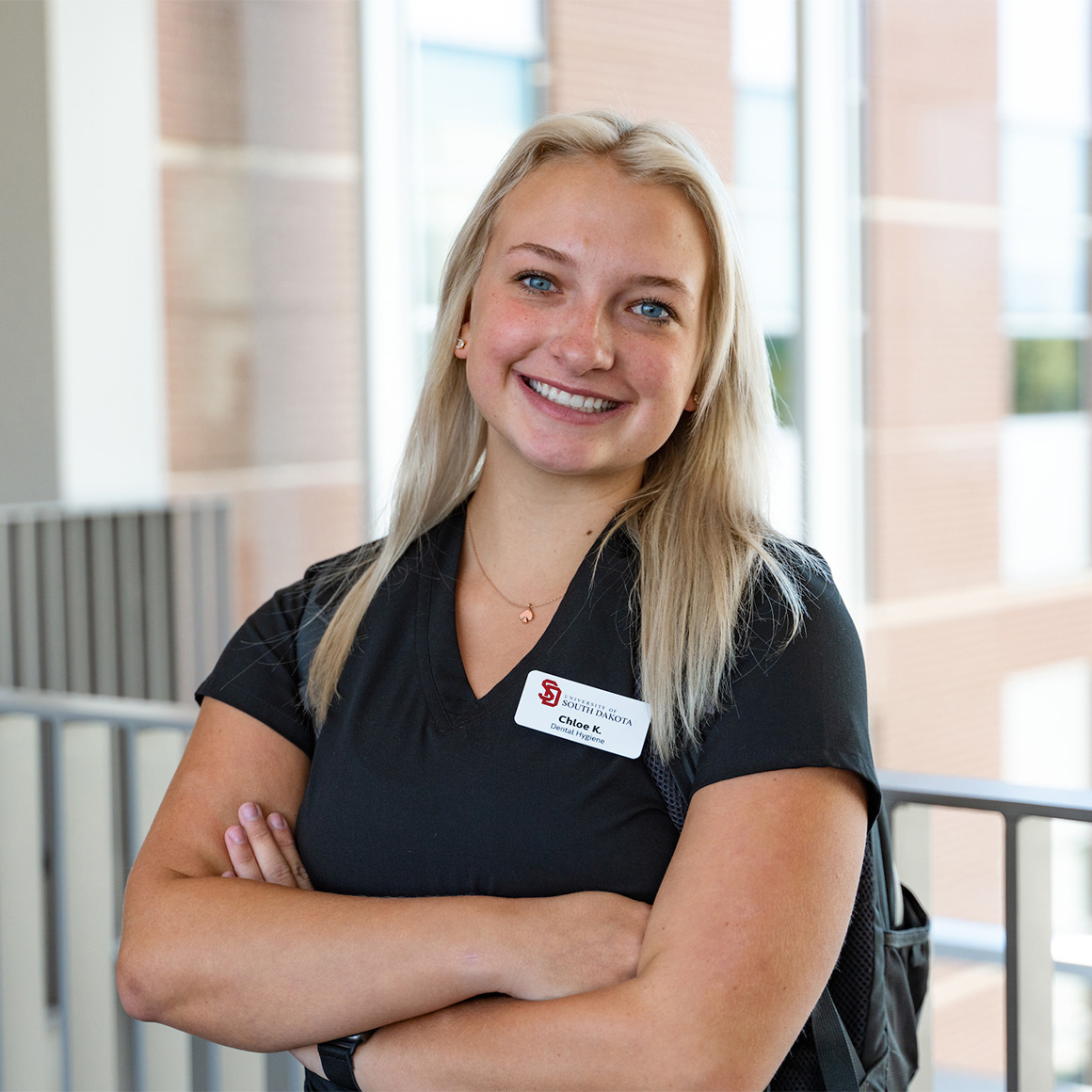 A Health sciences student smiling.