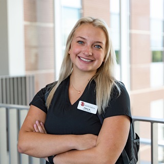 A Health sciences student smiling.