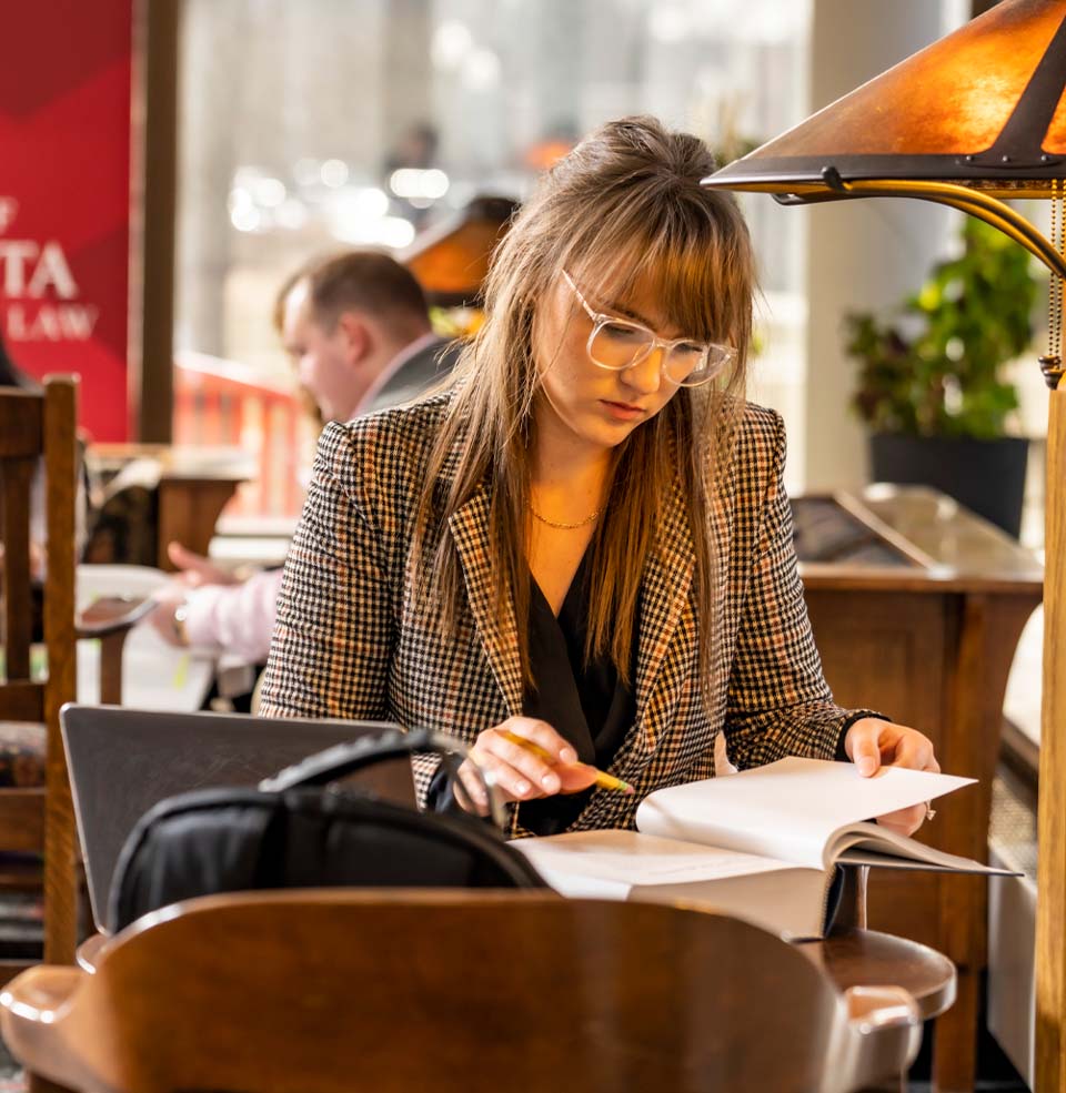 Female Law Student Studying.