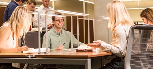 Law Students Studying Around a Table.