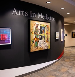 The Arts in Medicine gallery with hanging photos.