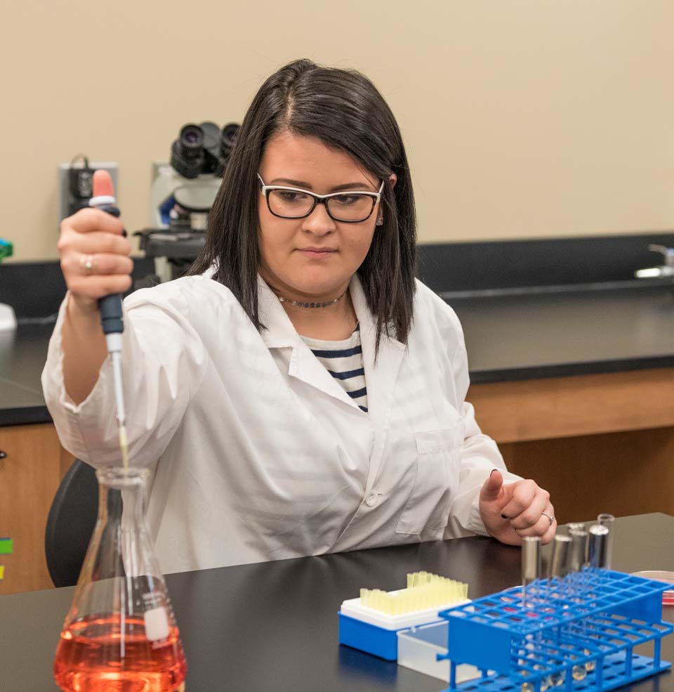 Female Medical Student Working in a Lab