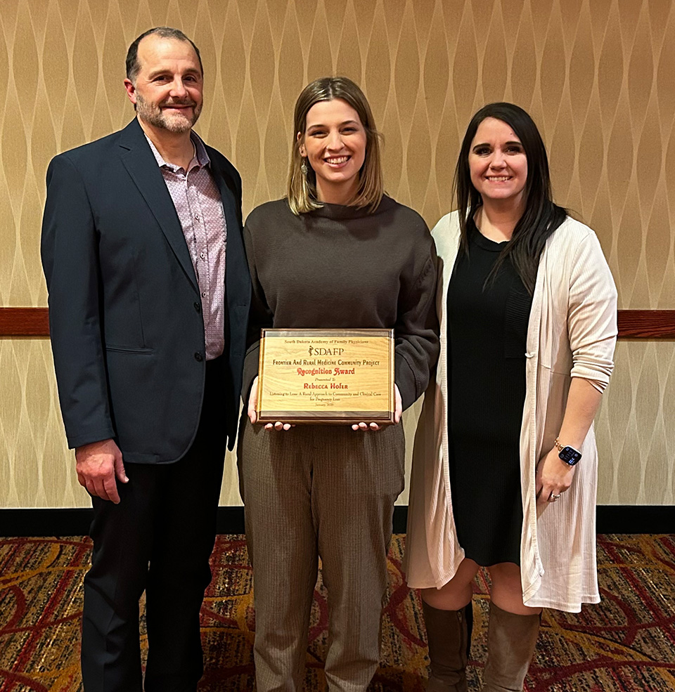 Hofer recieving award
