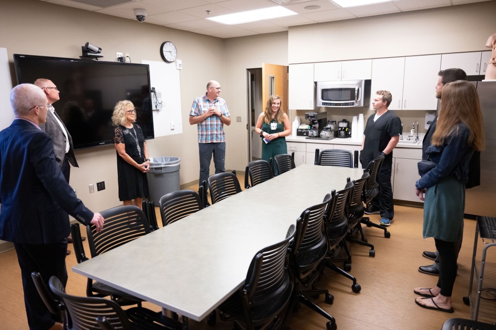 Visitors touring the Parry Center lab facilities and meeting room.