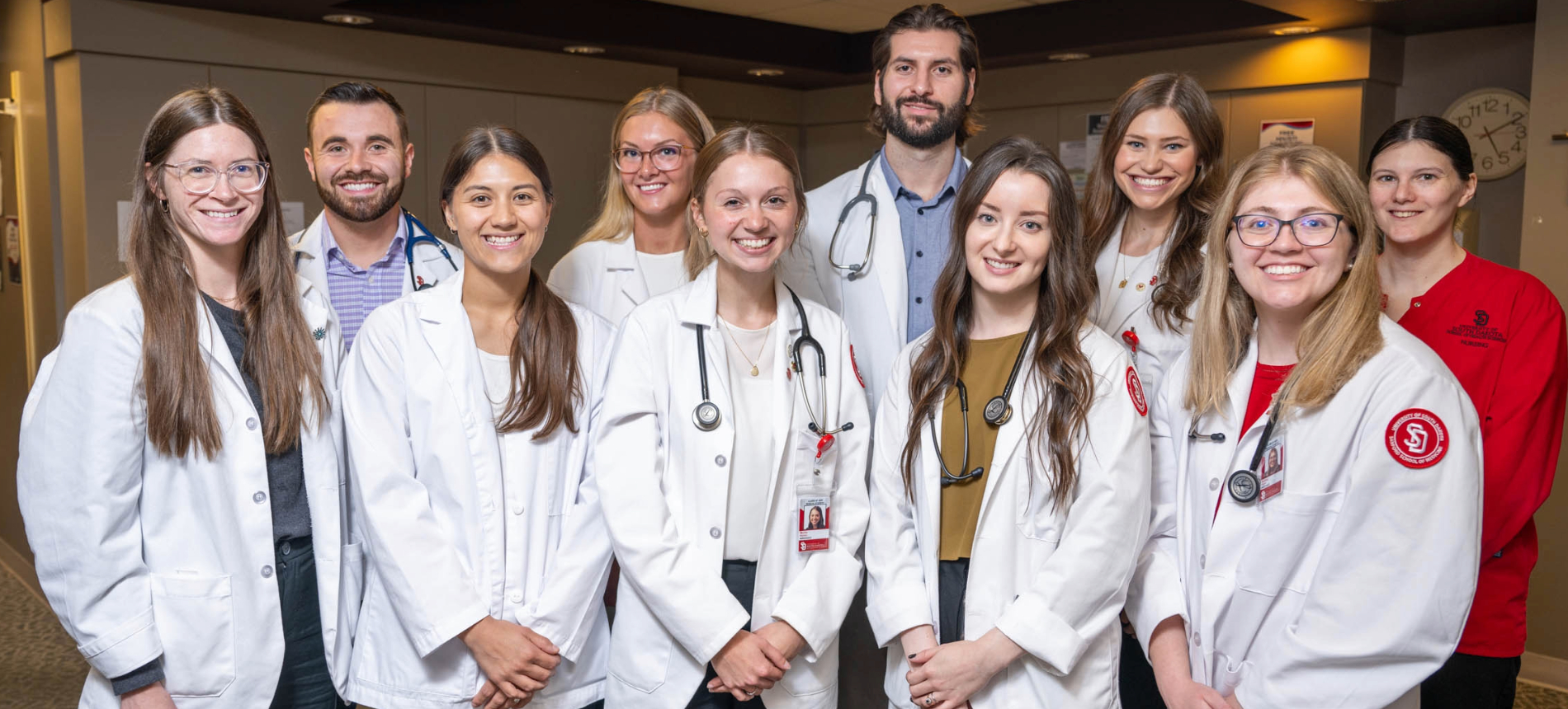 A group of Medicine students smiling at the camera.