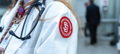Sanford School of Medicine student's white coat