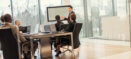 A group of people attending a business meeting.