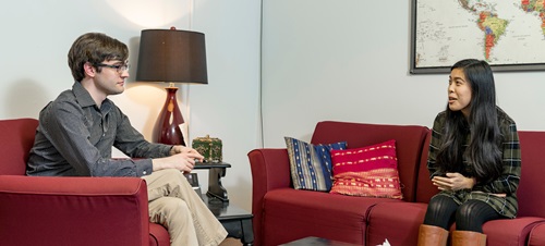 Two Psychology students talk in a study lounge