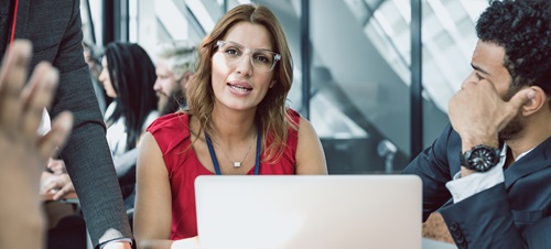 People talking during a meeting.