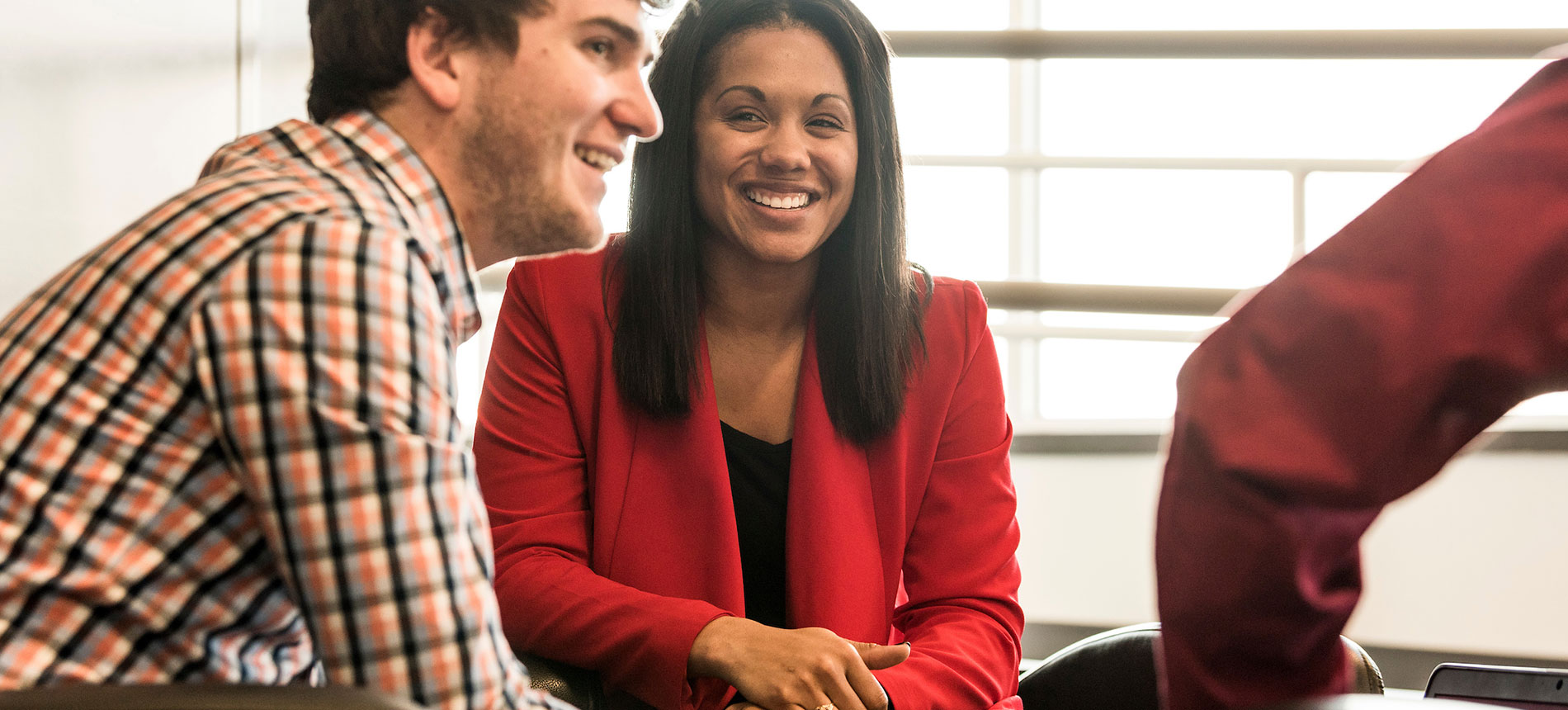 KSM students smiling in the classroom.