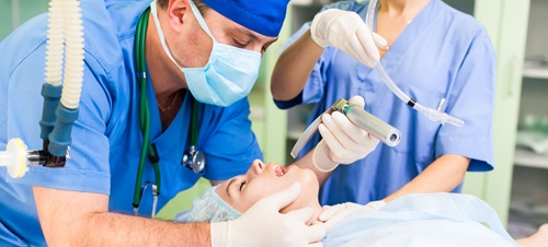 A USD student gets first hand experience giving a patient Anesthesia in a hospital. 