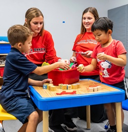 Students Gaining Hands-On Experience Working With Patients Inside a Clinic.