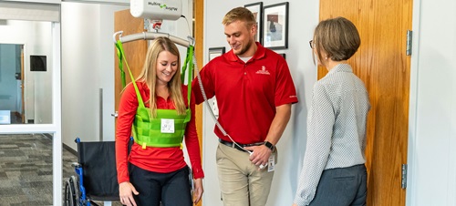 Physical therapy training with a student.