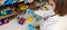A BBS Student using a dropper during a lab test.