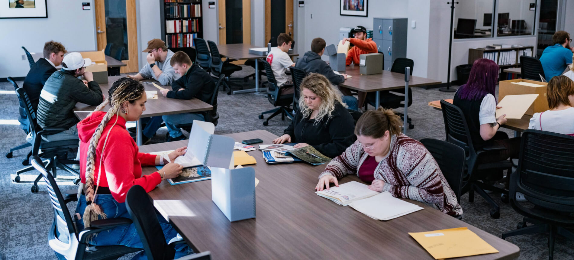Students studying in the ID weeks library.