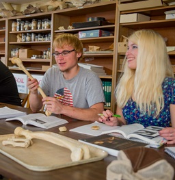 Students Examining Bones in a Lab