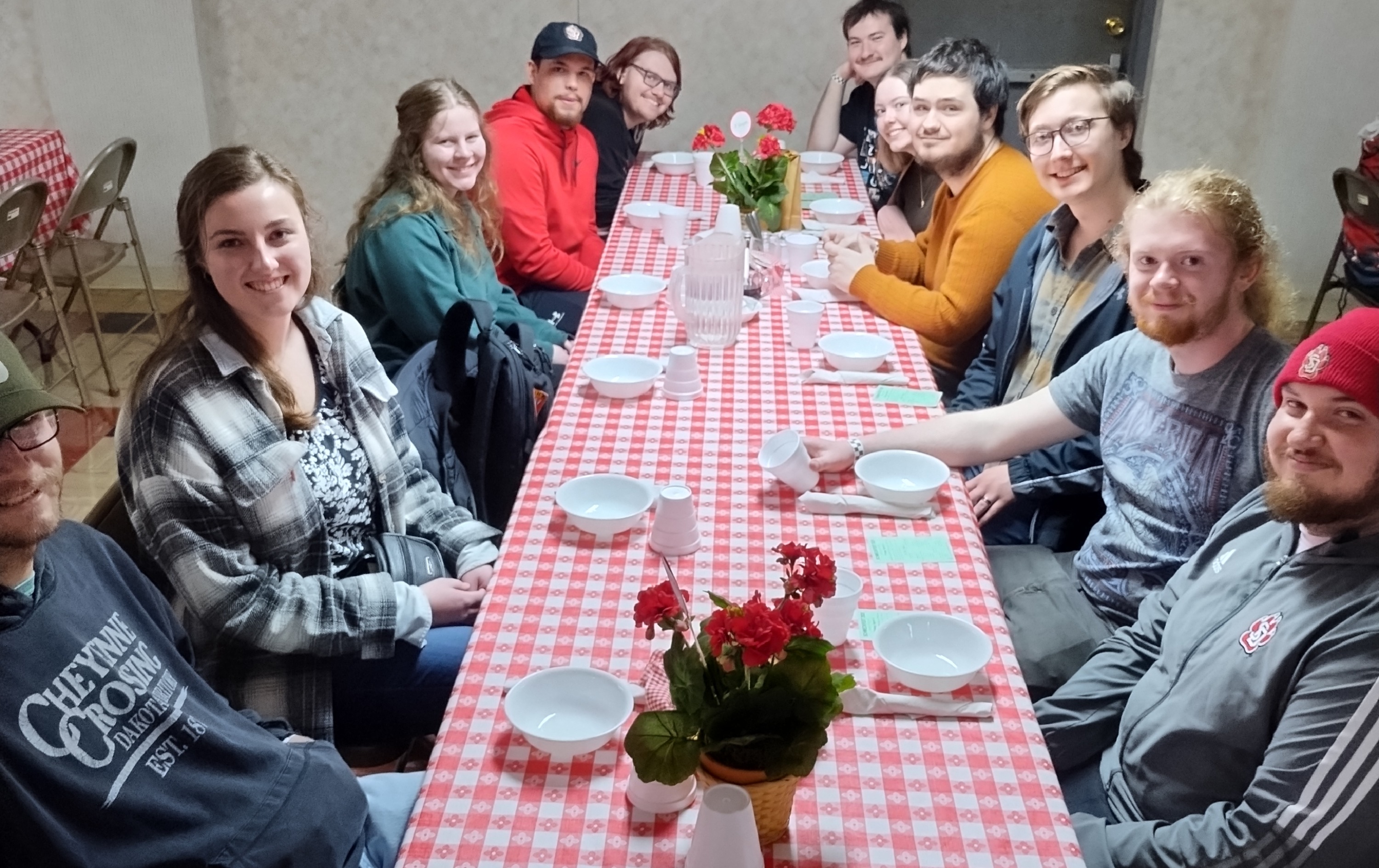 Students gathered around the table at Schmeckfest 