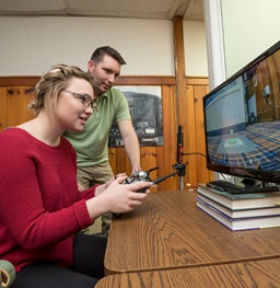 Kami Pearson Sitting at a Lab Station.