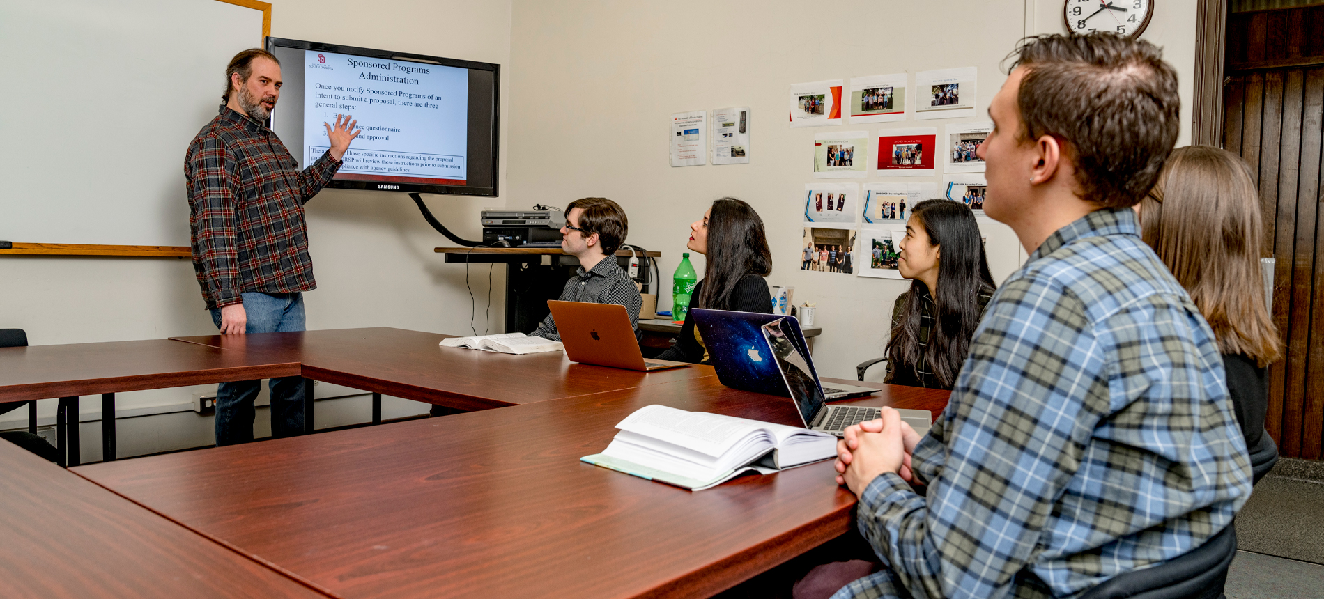 Psychology Professor Presenting to Students.
