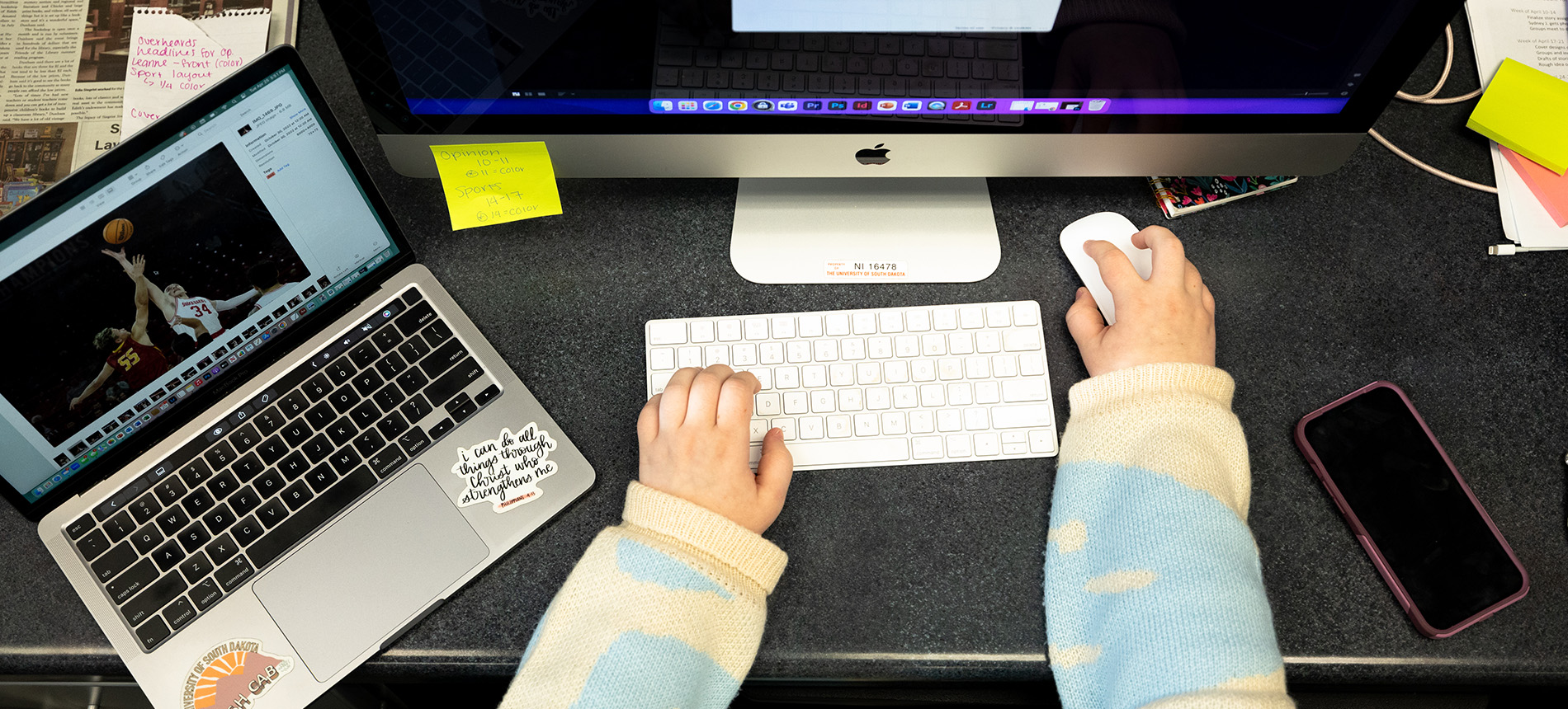 Photo of a desk with laptop, monitor, mouse, and keyboard.