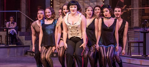 Students perform Cabaret musical on stage.