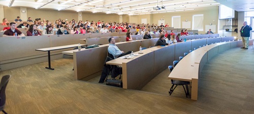 Classroom of Students Listening to a Professor's Lecture.