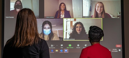 Group of Females on Video Chat Having a Discussion