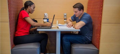 Two Students Studying in a Booth in the Muenster University Center