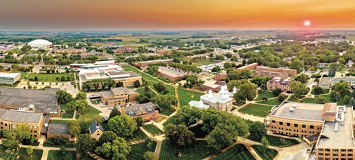 Drone image of campus at sunset Drone image of campus at sunset