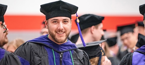 Picture of a graduate student at graduation