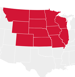 A map of the midwest with highlighted states in red. Minnesota is in dark red.