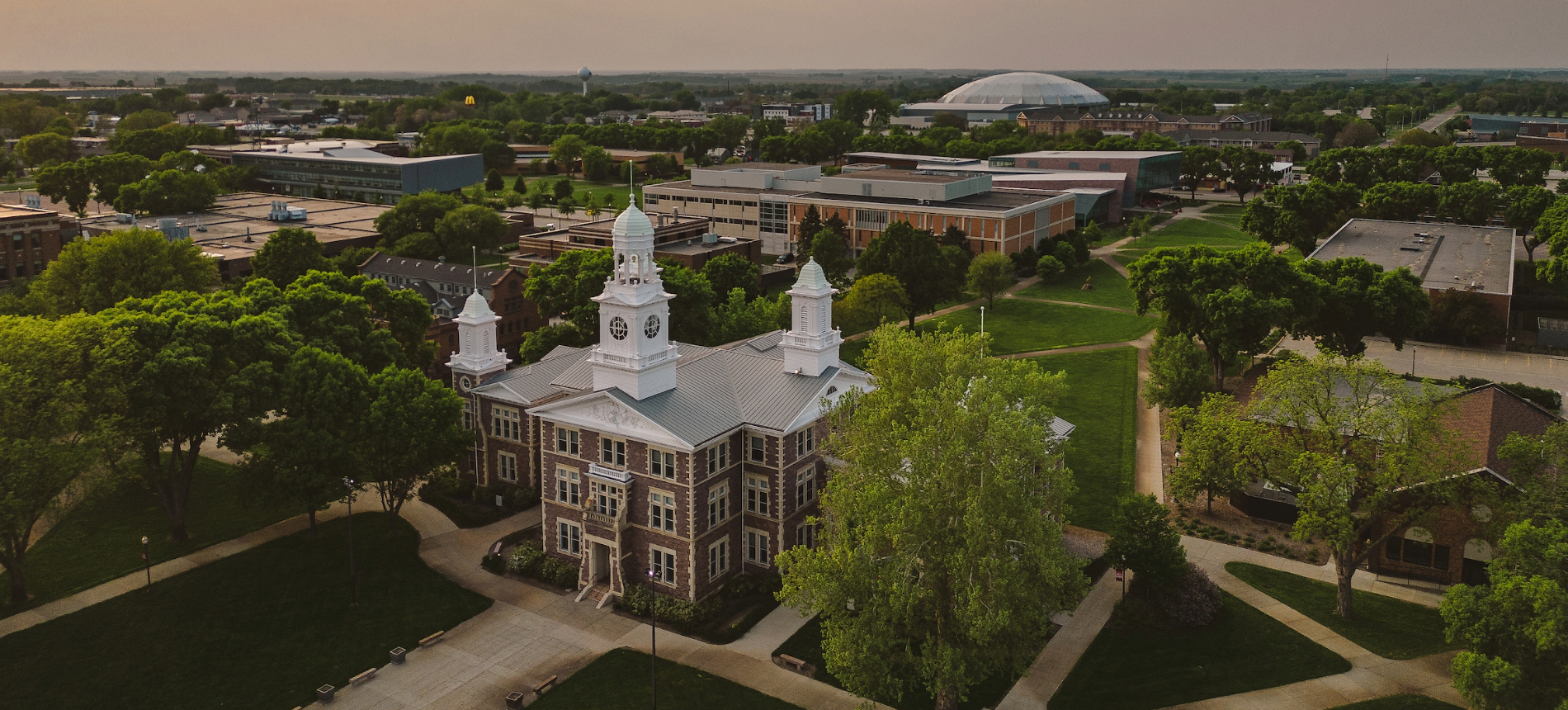 Old Main during a sunset in the fall.