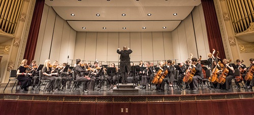 A USD symphony performance in progress.