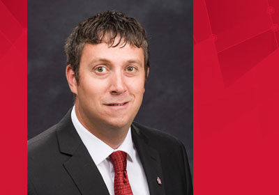 Brett Mockler smiling.