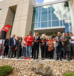 A group of USD administration ribbon cutting to open the National Music Museum.